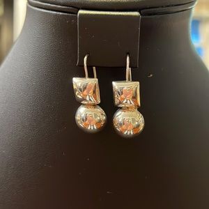 Mexican Solid Sterling Silver!! They are a bit heavy. stamped 0.925 SS.